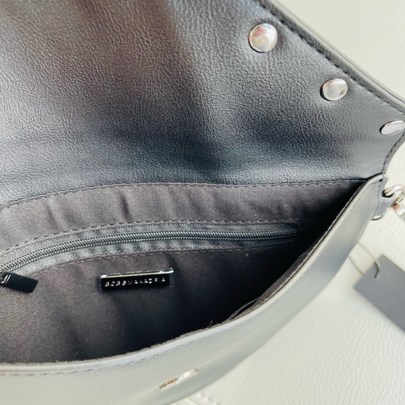 New With Tags
BCBG Pearl + Leather Inspired
Envelope Clutch in
BLACK - Picture 11 of 15